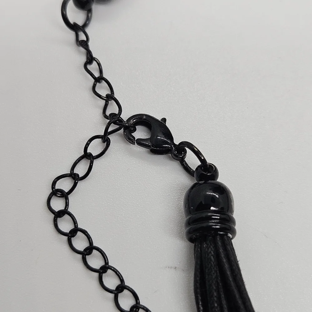 black multicord pendant with rhinestone pendant